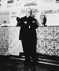 Photograph of Voysey, at an exhibition of his work in 1931