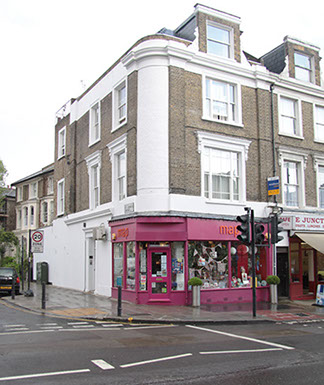 Image of Map Gift Shop on the corner of Junction Road and St. John’s Park, prior to the refurbishment carried out by Lyndon Goode Architects